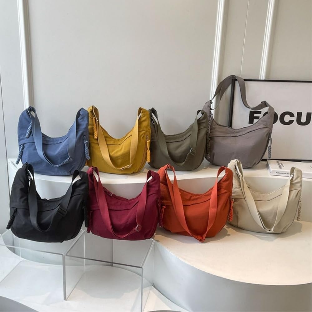đ„Modern axelremsvĂ€ska i nylon i enfĂ€rgad designđ„
