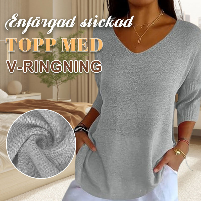 Enfärgad stickad topp med v-ringning