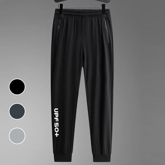 Unisex sportiga snabbtorkande andningsbara joggingbyxor